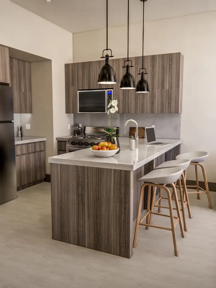 Rendering of kitchen island and living area open one bedroom | Salt Lake City Apartments